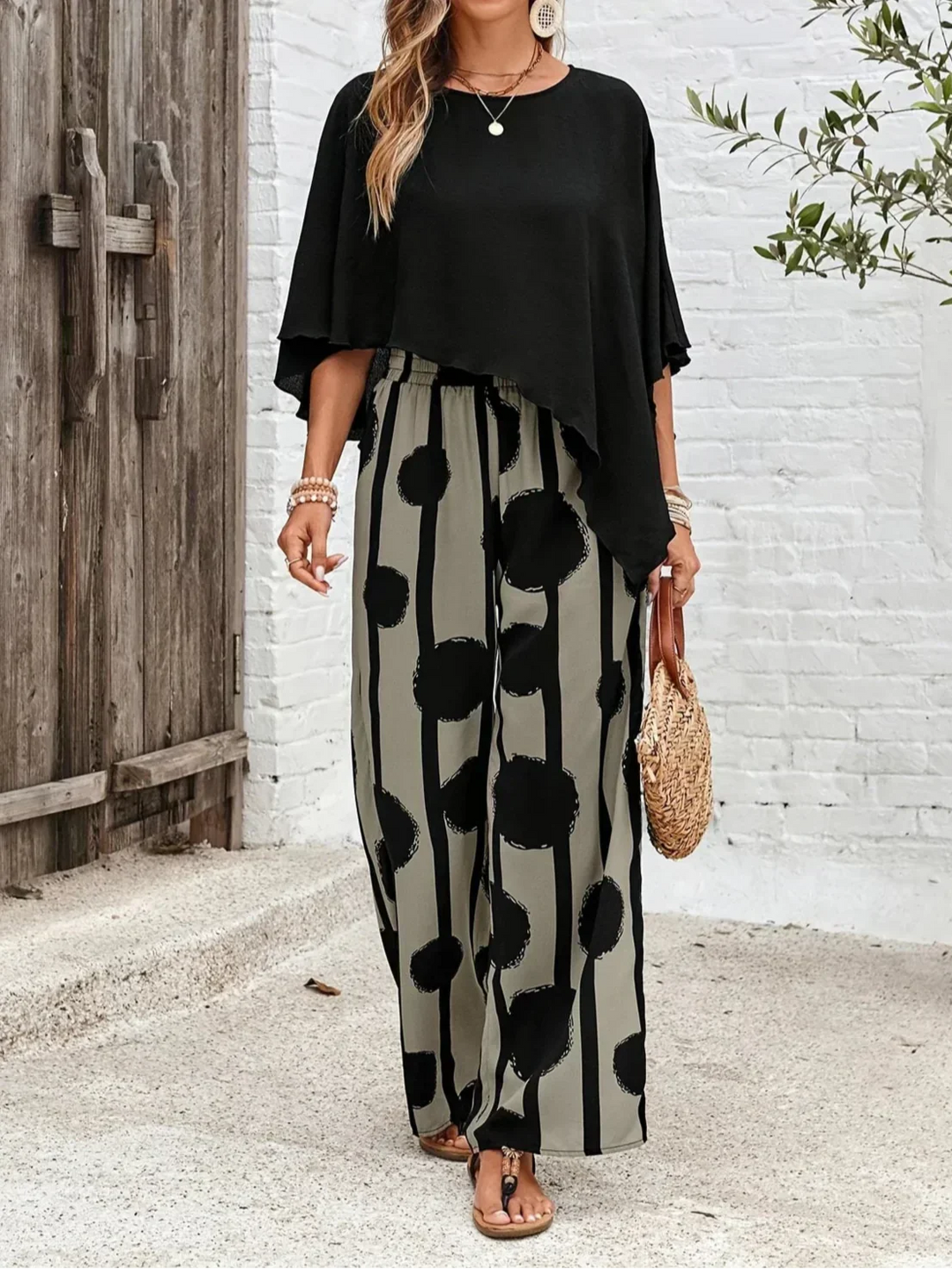 Trendy Women's Asymmetric Top with Stylish Printed Pant Set